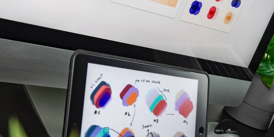 black iPad displaying color gradient
